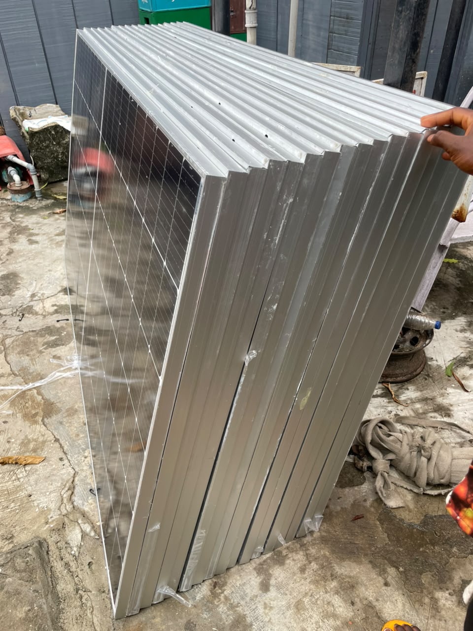 Stack of monocrystalline solar panels supplied by LEVAN COCMO LLP